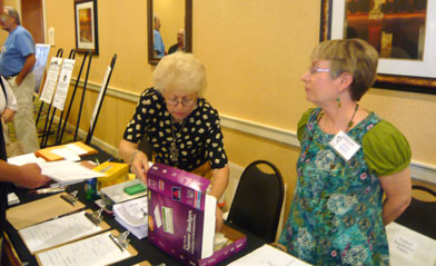 Dottie McCollum and Donna Nielsen worked hard at the festival registration desk and say, “We’ll see you next year.”