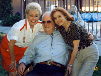Arizona Cowboy Rex Allen surrounded by two of his Republic leading ladies, Lyn Thomas (left) and Mary Ellen Kay during Rex Allen Western Days in Wilcox, AZ, in October 1999.