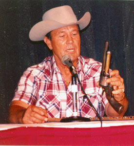 Don (“Johnny Ringo”) Durant explains the working of his seven-shooter LeMat at the Charlotte, NC, Western Film Fair in 1991.