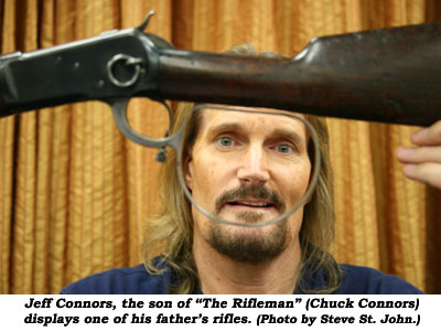 Jeff Connors, the son of "The Rifleman" (Chuck Connors) displays one of his father's rifles.  (Photo by Steve St. John.)