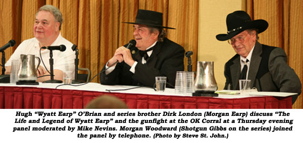 Hugh "Wyatt Earp" O'Brian and series brother Dirk London (Morgan Earp) discuss "The Life and Legend of Wyatt Earp" and the gunfight at the OK Corral at a Thursday evening panel moderated by Mike Nevins. Morgan Woodward (Shootgun Gibbs on the series) joined the panel by telephone.  (Photo by Steve St. John.)