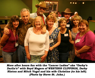 More after hours fun with the "Lancer Ladies" aka "Darby's Darlin's" with Boyd Magers of WESTERN CLIPPINGS, Darby Hinton and Mitch Vogel and his wife Christine (to his left). (Photo by Steve St. John.)