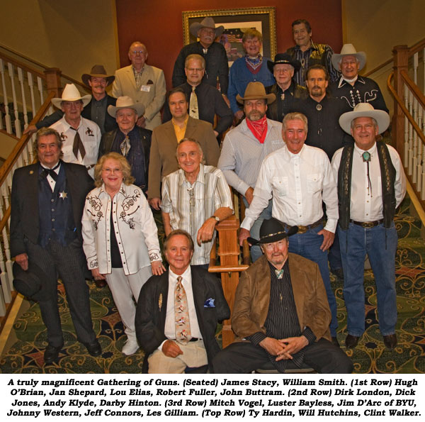 A truly magnificent Gathering of Guns. (Seated) James Stacym, William Smith. (1st Row) Hugh O'Brian, Jan Shepard, Lou Elias, Robert Fuller, John Buttram. (2nd Row) Dirk London, Dick Jones, Andy Klyde, Darby Hinton. (3rd Row) Mitch Vogel, Luster Bayless, Jim D'Arc of BYU, Johnny Western, Jeff Connors, Les Gilliam. (Top Row) Ty Hardin, Will Hutchins, Clint Walker.