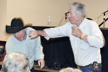 Bob Fuller and friend Tony Gill demonstrate camera techniques for stunt fighting.