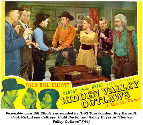 Peaceable man Bill Elliott surrounded by (L-R) Tom London, Roy Barcroft, Jack Kirk, Anne Jeffreys, Budd Buster and Gabby Hayes in "Hidden Valley Outlaws" ('44).