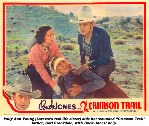 Polly Ann Young (Loretta's real life sister) aids her wounded "Crimson Trail" father, Carl Stockdale, with Buck Jones' help.