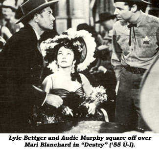 Lyle Bettger and Audie Murphy square off over Mari Blanchard in "Destry" ('55 U-I).