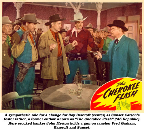 A sympathetic role for a change for Roy Barcroft (center) as Sunset Carson's foster father, former outlaw known as "The Cherokee Flash" ('45 Republic). Here crooked banker John Merton holds a gun on rancher Fred Graham, Barcroft and Sunset.