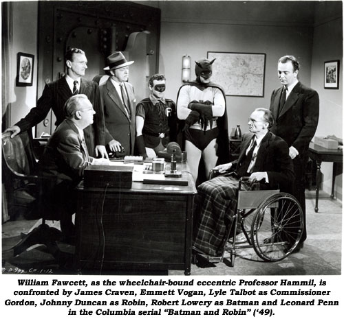 William Fawcett, as the wheelchair-bound eccentric Professor Hammil, is confronted by James Craven, Emmett Vogan, Lyle Talbot as Commissioner Gordon, Johnny Duncan as Robin, Robert Lowery as Batman and Leonard Penn in the Columbia serial "Batman and Robin" ('49).