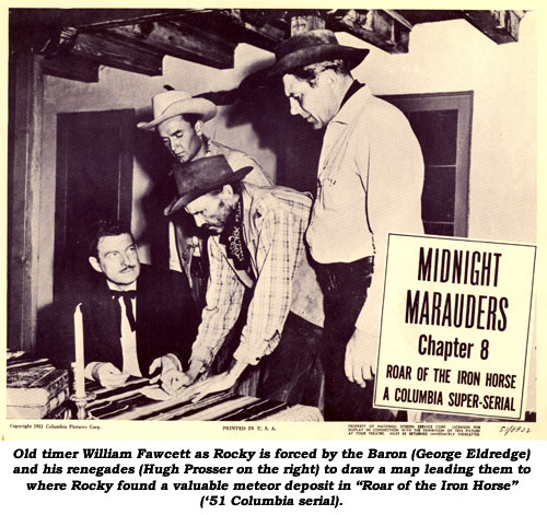 Old timer William Fawcett as Rocky is forced by the Baron (George Eldredge) and his renegades (Hugh Prosser on the right) to draw a map leading them to where Rocky found a valuable meteor deposit in "Roar of the Iron Horse" ('51 Columbia serial).