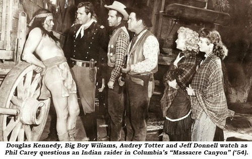 Douglas Kennedy, Big Boy Williams, Audrey Totter and Jeff Donnell watch as Phil Carey questions an Indian raider in Columbia's "Massacre Canyon" ('54).