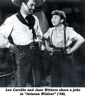 Leo Carrillo and Jane Withers share a joke in "Arizona Wildcat" ('38).