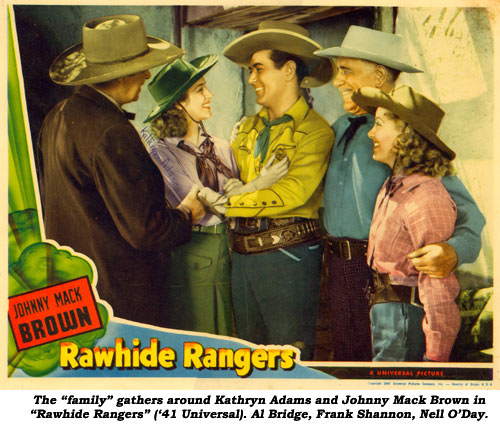 The "family" around Kathryn Adams and Johnny Mack Brown in "Rawhide Rangers" ('41 Universal). Al Bridge, Frank Shannon, Nell O'Day.