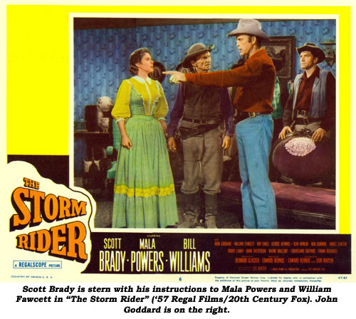 Scott Brady is stern with his instructions to Mala Powers and William Fawcett in "The Storm Rider" ('57 Regal Films/20th Century Fox). John Goddard is on the right.