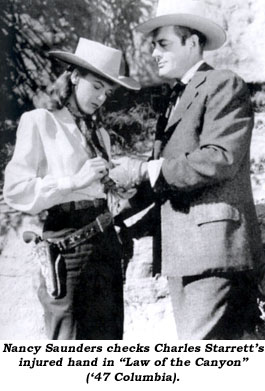 Nancy Saunders checks Charles Starrett's injured hand in "Law of hte Canyon" ('47 Columbia).