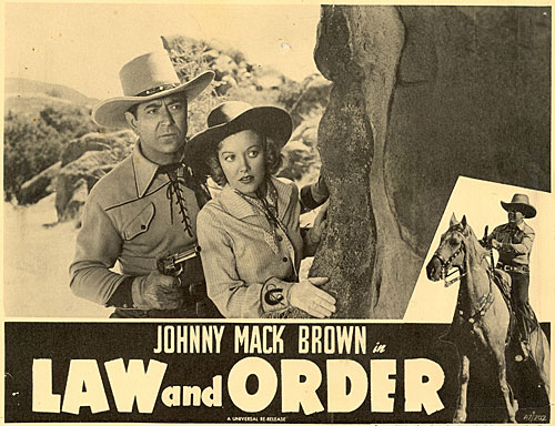 Title card for "Law and Order" starring Johnny Mack Brown and Nell O'Day.