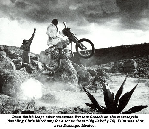 Dean Smith leaps after stuntman Everett Creach on the motorcycle (doubling Chris Mitchum) for a scene from "Big Jake" ('70). Film was shot near Durango, Mexico.