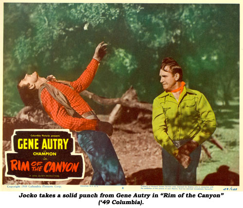 Jocko takes a solid punch from Gene Autry in "Rim of the Canyon" ('49 Columbia).