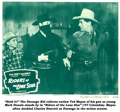 "Hold it!" The Durango Kid relieves outlaw Ted Mapes of his gun as young Mark Dennis stands by in "Riders of the Lone Star" ('47 Columbia). Mapes often doubled Charles Starrett as Durango in the action scenes.