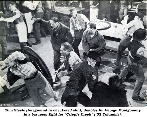 Tom Steele (foreground in checkered shirt) doubles for George Montgomery in a bar room fight for "Cripple Creek" ('52 Columbia).