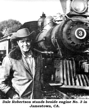 Dale Robertson stands beside engine No. 3 in Jamestown, CA.