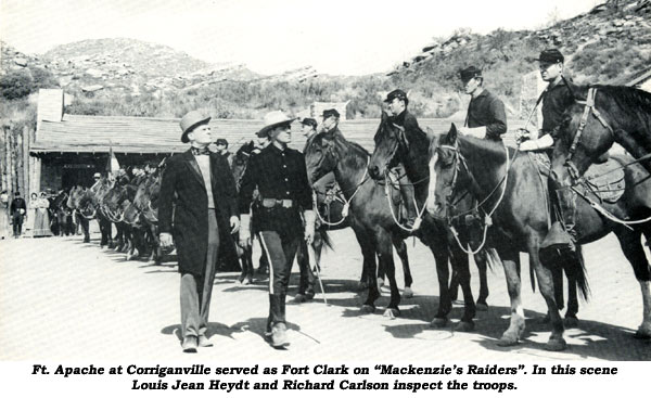 Ft. Apache at Corriganville served as Fort Clark on "Mackenzie's Raiders". In this scene Louis Jean Heydt and Richard Carlson inspect the troops.