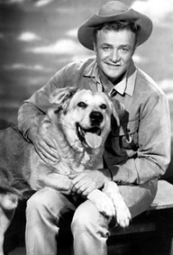 Brian Keith as Dave Blassingame with his dog Brown (Spike).