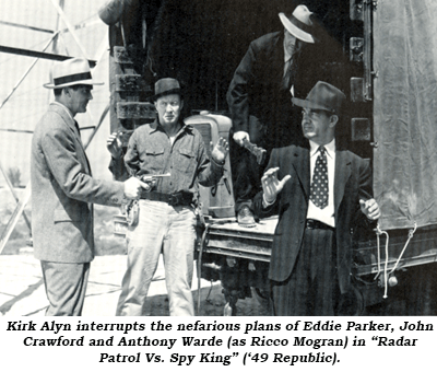 Kirk Alyn interrupts the negarious plans of Eddie Parker, John Crawford and Anthony Warde (as Ricco Morgan) in "Radar Patrol vs. Spy King" ('49 Republic).