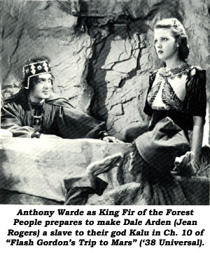 Anthony Warde as King Fir of the Forest People prepares to make Dale Arden (Jean Rogers) a slave to their god Kalu in Ch. 10 of "Flash Gordon's Trip to Mars" ('38 Universal).