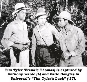 Tim Tyler (Frankie Thomas) is captured by Anthony Warde (L) and Earle Douglas in Universal's "Tim Tyler's Luck" ('37).