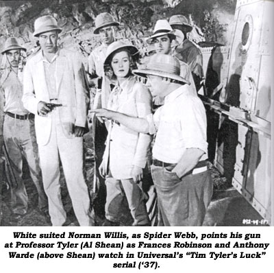 White suited Norman Willis, as Spider Webb, points his gun at Professor Tyler (Al Shean) as Frances Robinson and Anthony Warde (above Shean) watch in Universal's "Tim Tyler's Luck" serial ('37).