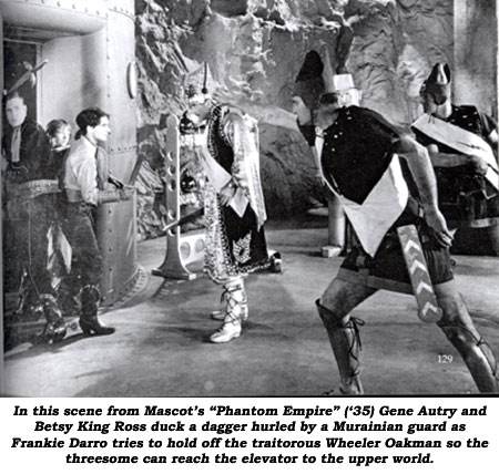 In this scene from Mascot's "Phantom Empire" ('35) Gene Autry and Betsy King Ross duck a dagger hurled by a Murainian guard as Frankie Darro tries to hold off the traitorous Wheeler Oakman so the threesome can reach the elevator to the upper world.