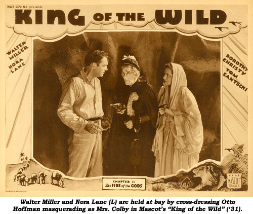 Walter Miller and Nora Lane (L) are held at bay by cross-dressing Otto Hoffman masquerading as Mrs. Colby in Mascot's "King of the Wild" ('31).