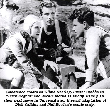 Constance Moore as Wilma Deering, Buster Crabbe as "Buck Rogers" and Jackie Moran as Buddy Wade plan their next move in Universal's sci-fi serial adaptation of Dick Calkins and Phil Nowlan's comic strip.