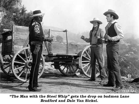 "The Man with the Steel Whip" gets the drop on badmen Lane Bradford and Dale Van Sickel.