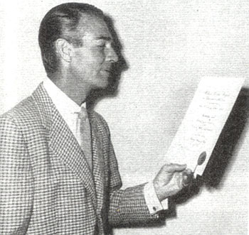 Randolph Scott checks his 1951 award from The Motion Picture Exhibitors of America. Scott was ranked as one of the Top 10 Western Stars that year. More award photos from 1950, 1951 and 1952 will be in WESTERN CLIPPINGS #85 (Sept./Oct. '08).