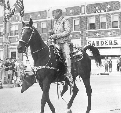 Rex Allen rides in the 101 Ranch Parade in Ponca City, Oklahoma, in 1966