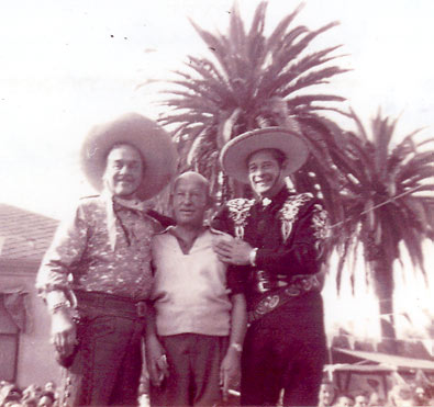 Leo Carrillo as Pancho, comic Vince Barnett, and Duncan Renaldo (The Cisco Kid) pose in 1954 at St. Catherine's Military Academy in Anaheim, CA.