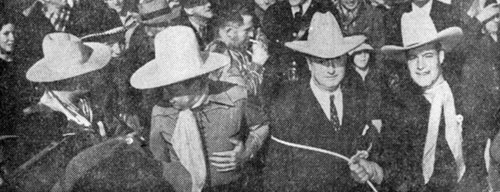 Charles Starrett (right) tossed a lariat over postmaster general James Farley and topped him off with a cowboy hat. On the left are convention general chairman Pat Flynn and Monte Blue. Actress Rochelle Hudson and Arthur “Dagwood” Lake were also in attendance. 