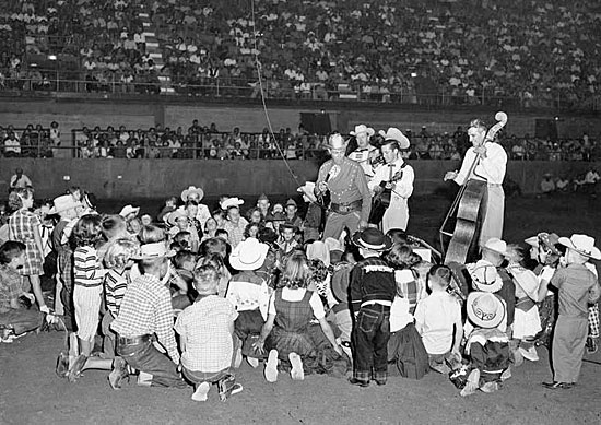 PRC star Eddie Dean performs at the 1955 Heart O’Texas Fair and Rodeo in Waco, Texas. (Photo courtesy Roy Bonario.) 