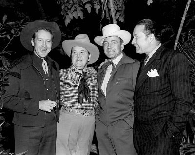 Dick Foran, producer Henry McCrae, Buck Jones and Monte Blue take a break from filming “Riders of Death Valley” serial (‘41 Universal). (Thanx to Bobby Copeland.)