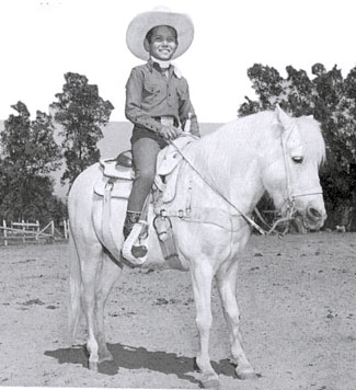 Jug on his only trick riding pony, Highbrow. Over his lifetime Don learned to train a number of animals both domesticated and wild. He trained horses and ponies more than any other animal. 