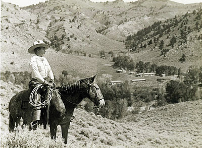Tim McCoy looks over his Eagle Nest Ranch near Thermopolis, WY. Taken in 1927. (Photo courtesy Elijah Cobb.) 