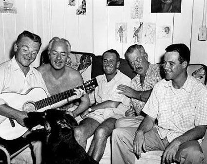 “Wagon Train”—Ward Bond has some fun with (L-R) James Cagney, William Powell, Henry Fonda and Jack Lemmon, as the cast of “Mr. Roberts” (‘55) relax backstage. 