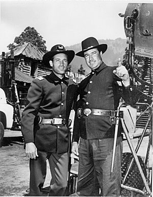 On location in Mexico City, Guy Madison meets J. Trinidad Villa, son of Pancho Villa, who plays a Civil War soldier in “The Last Frontier” with Madison and 
Victor Mature. (‘55).