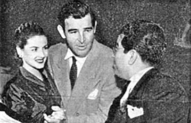 During a night out at the Mocambo, Rod Cameron requests a dance with B-Western leading lady Virginia Belmont from her husband.