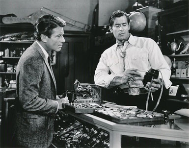 Clint Walker as he appeared on an episode of “77 Sunset Strip” with 
Effrem Zimbalist Jr. 