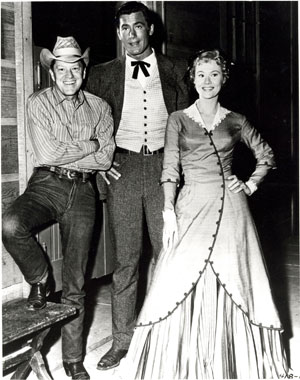Clint Walker with Michael O’Shea and Virginia Mayo. O’Shea and Mayo were married from ‘47 til his death in ‘73. 
