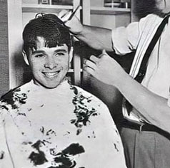 Audie Murphy gets a G.I. haircut. Probably for the filming of his bio-pic 
“To Hell and Back”. 