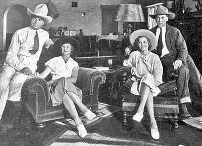 William S. Hart (right) and friends in Hart’s home in Santa Clarita, CA. 